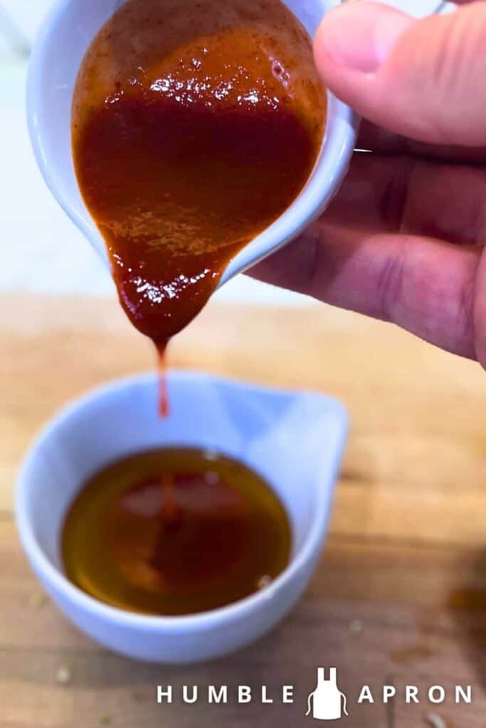 Sriracha poured into Honey