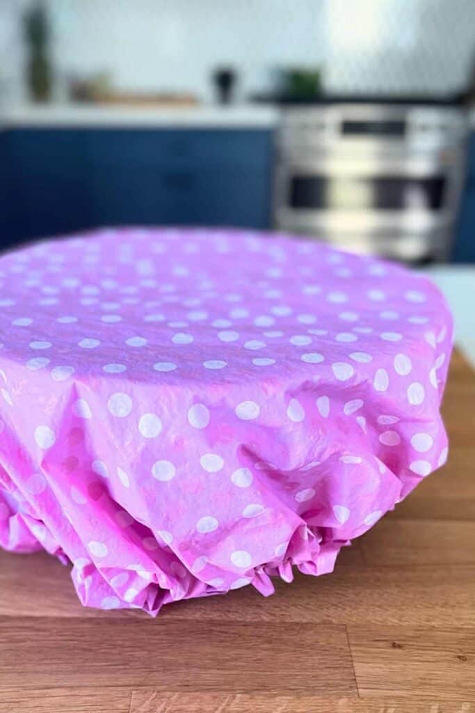 Shower cap covering resting dough