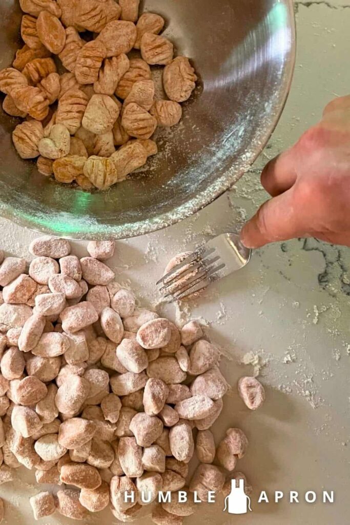 Sweet Potato Gnocchi pressed with a fork to shape